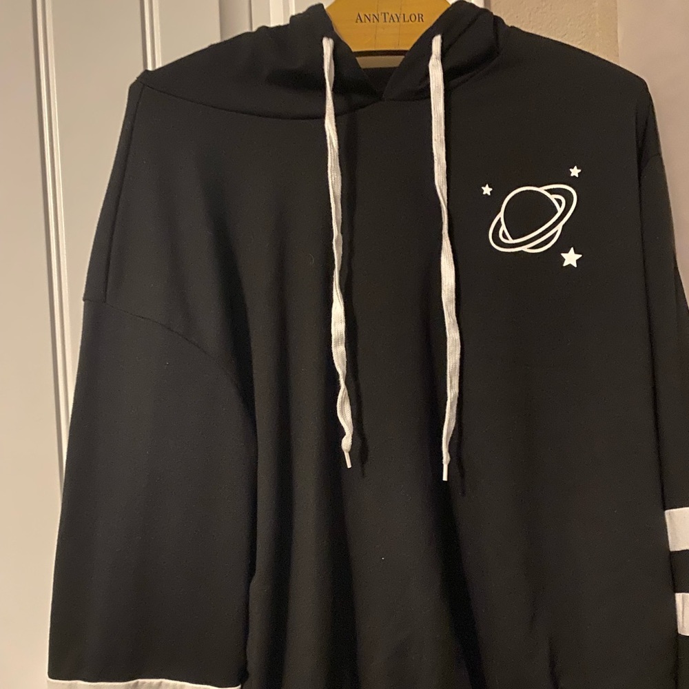 Black hoodie with planet and stars